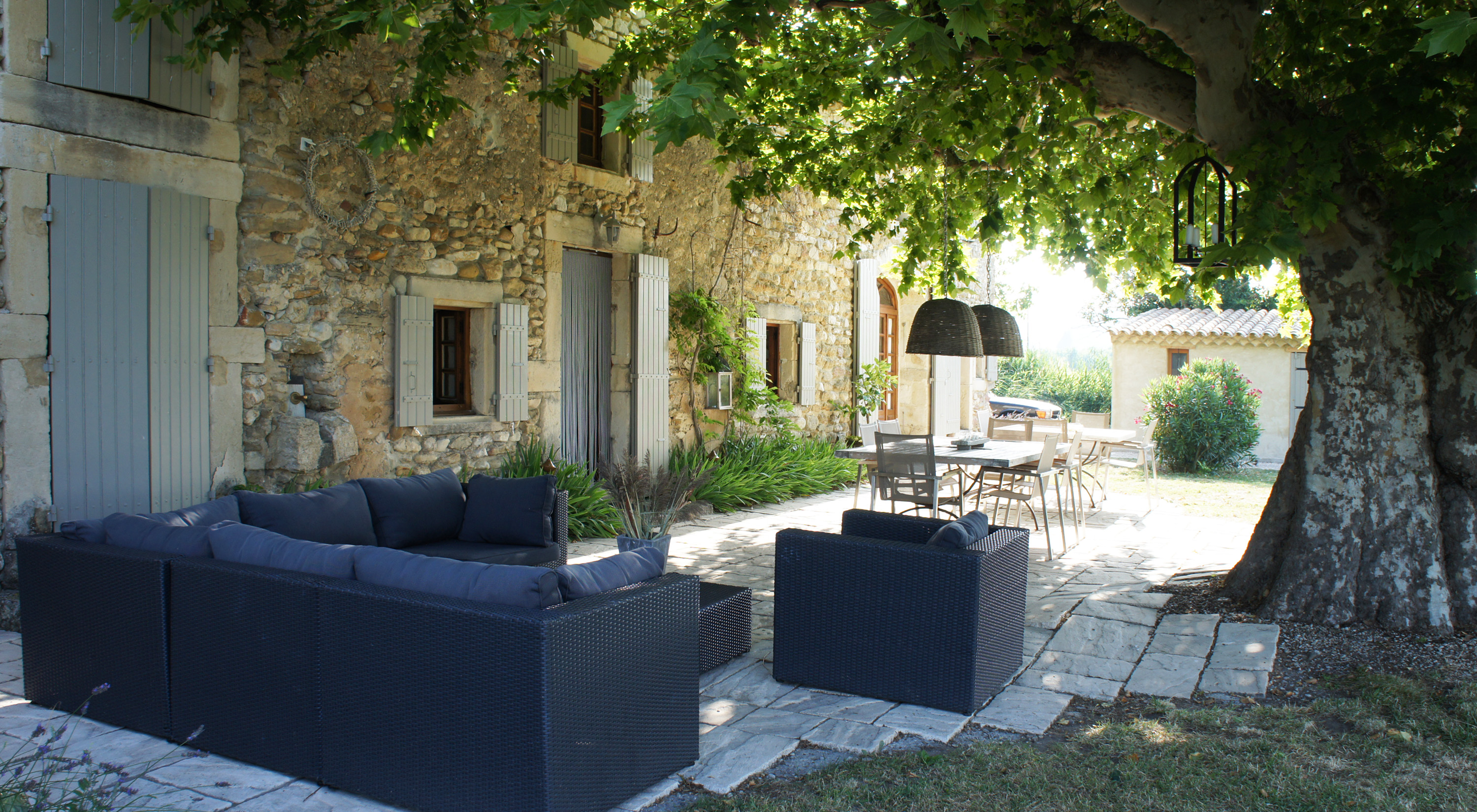 Large paved terrace in front of the house