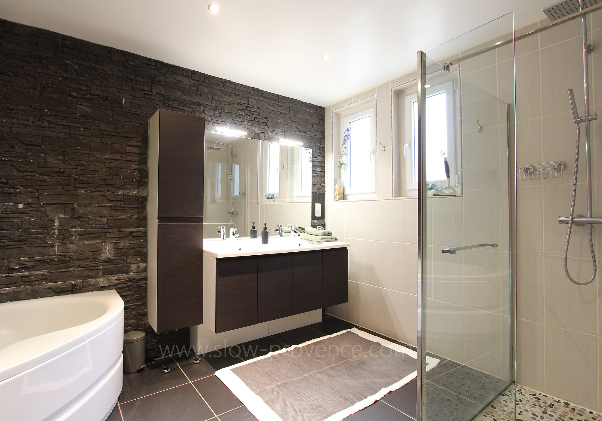 Full bathroom with shower + bathtub