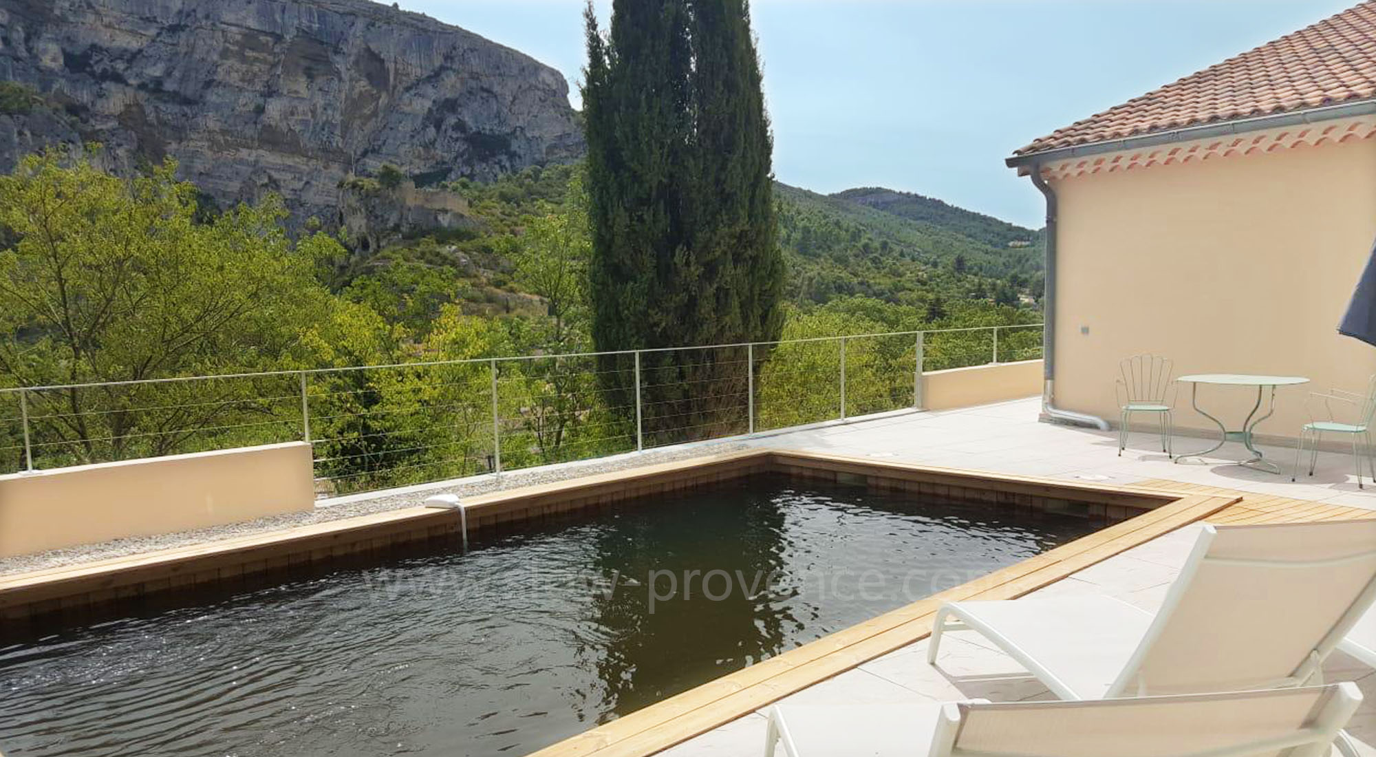 Swimming pool with brown wooden lining