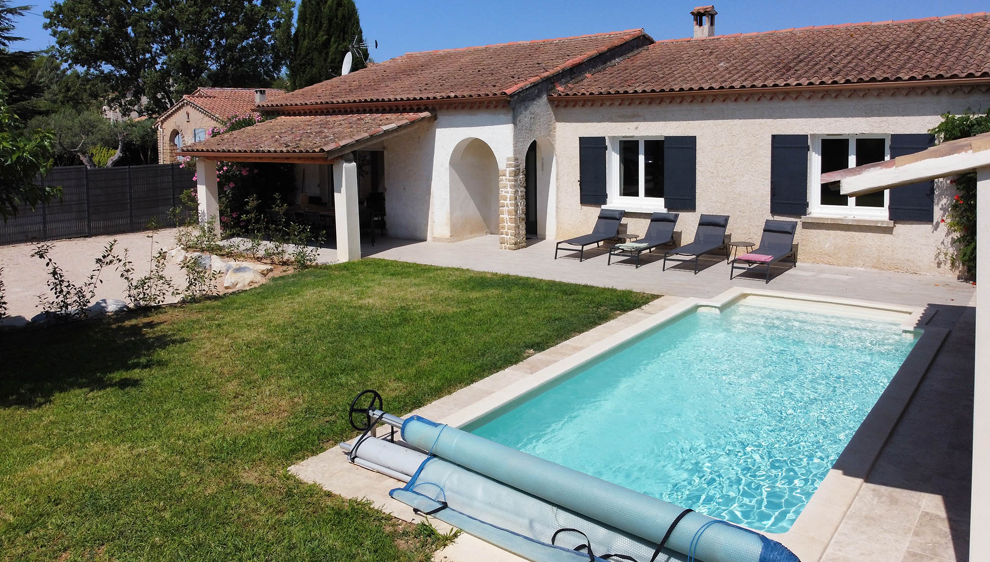 A fenced garden and a private pool