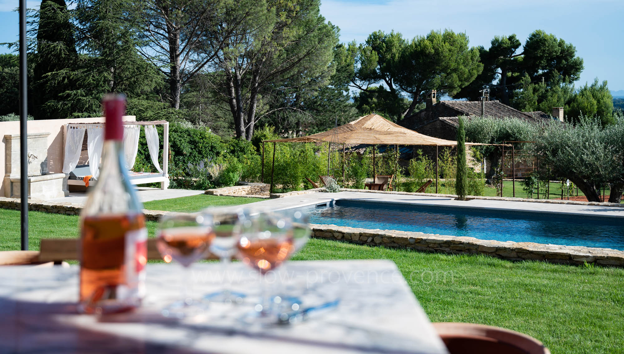 A glass of rosé, cicadas and a nice swimming pool