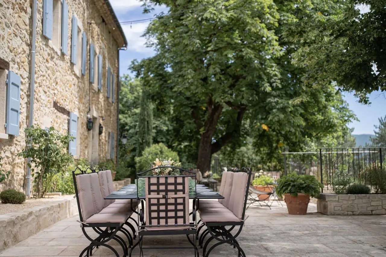 A well-maintained, tree-lined exterior