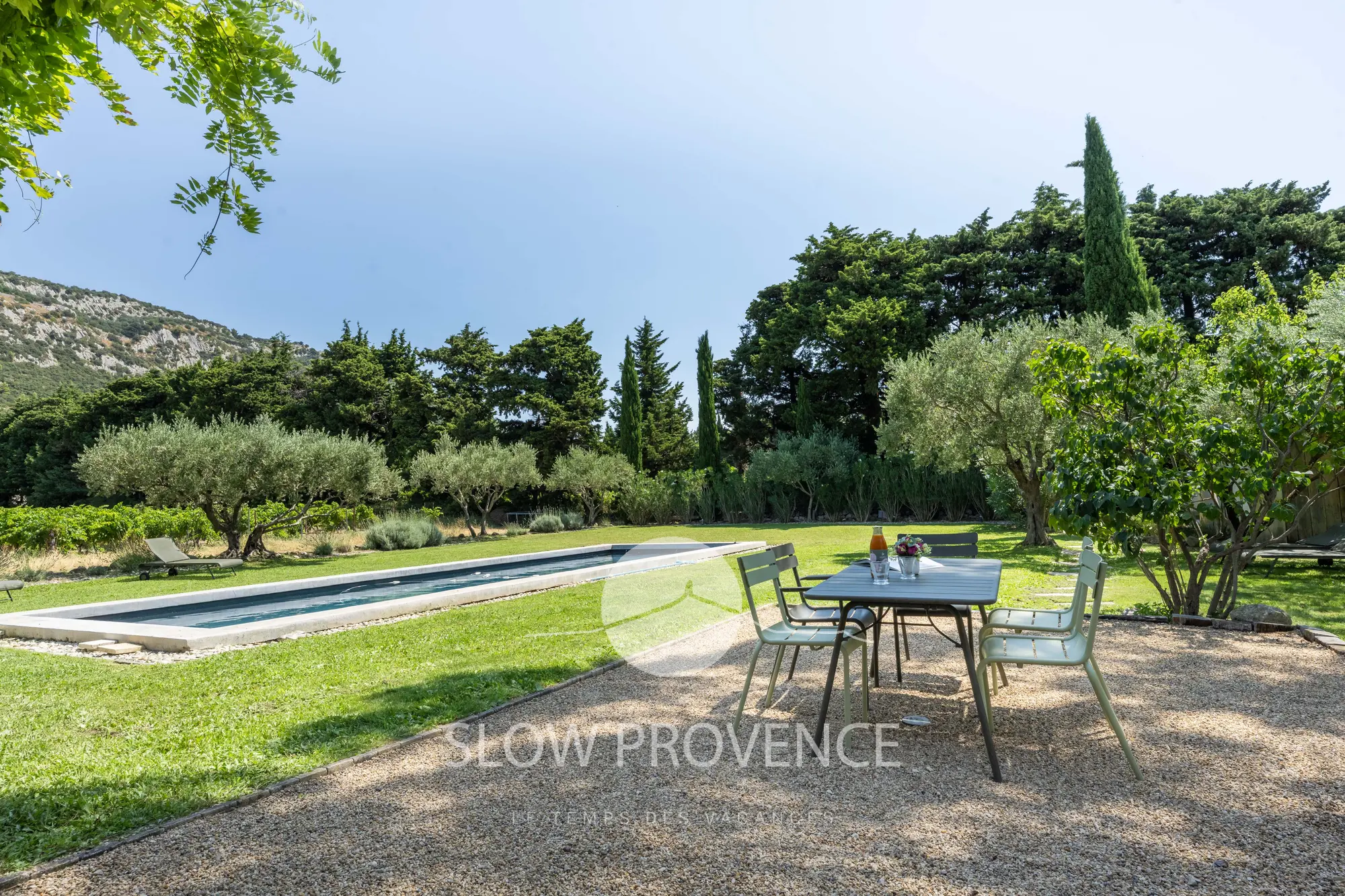 Outdoor dining area by the pool