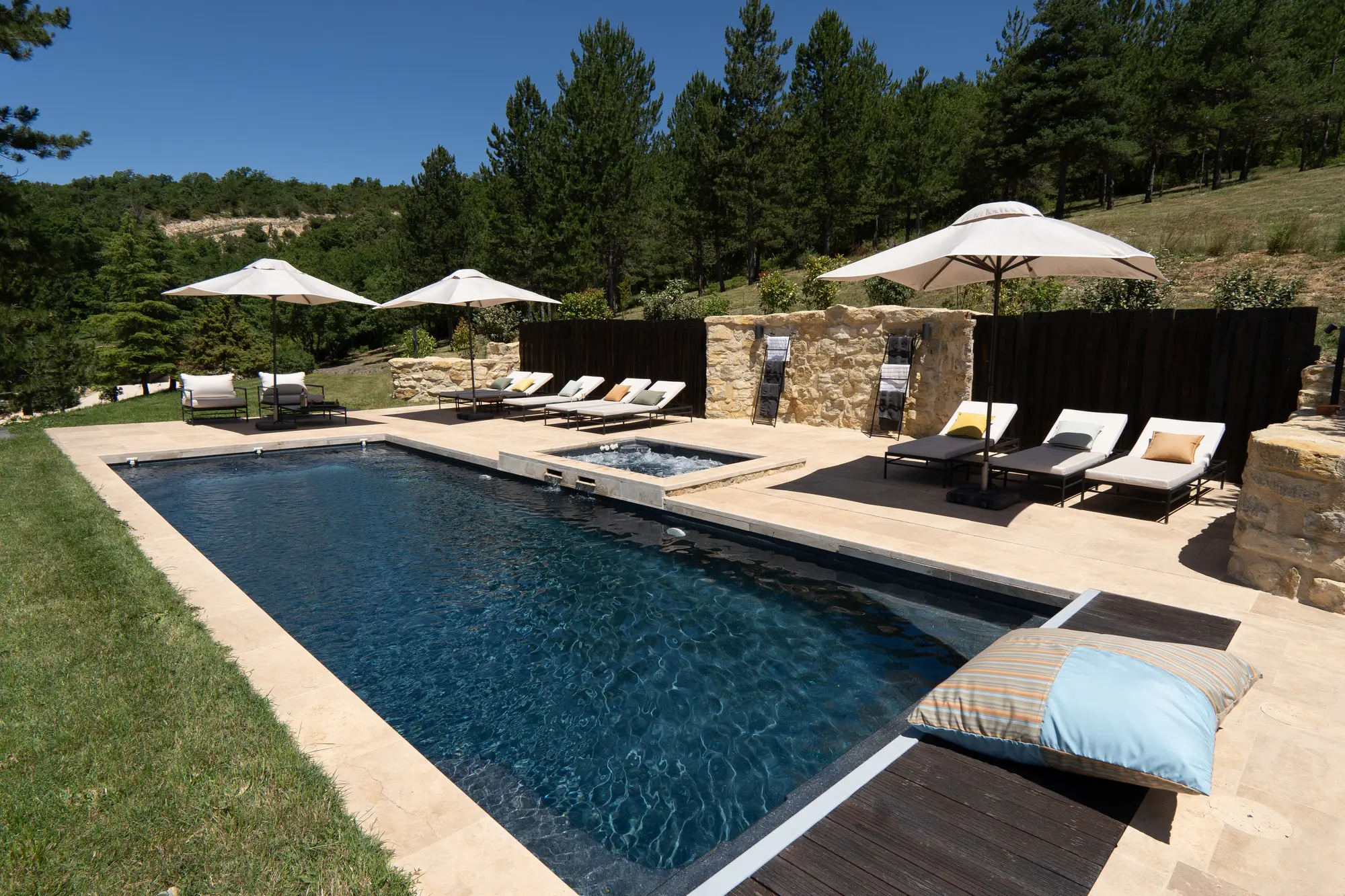 A very nicely landscaped pool area
