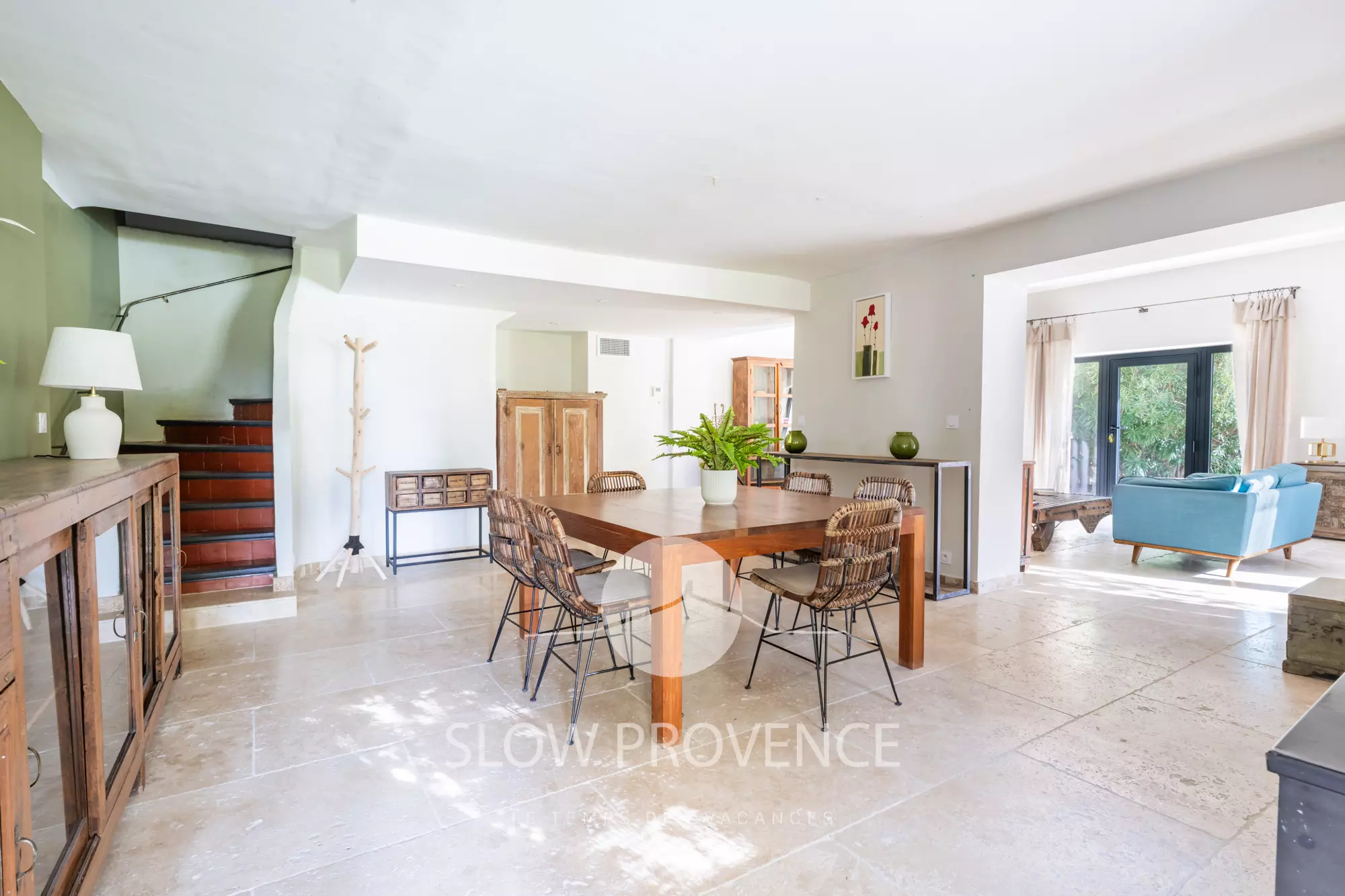 Large, bright living room open to the outside