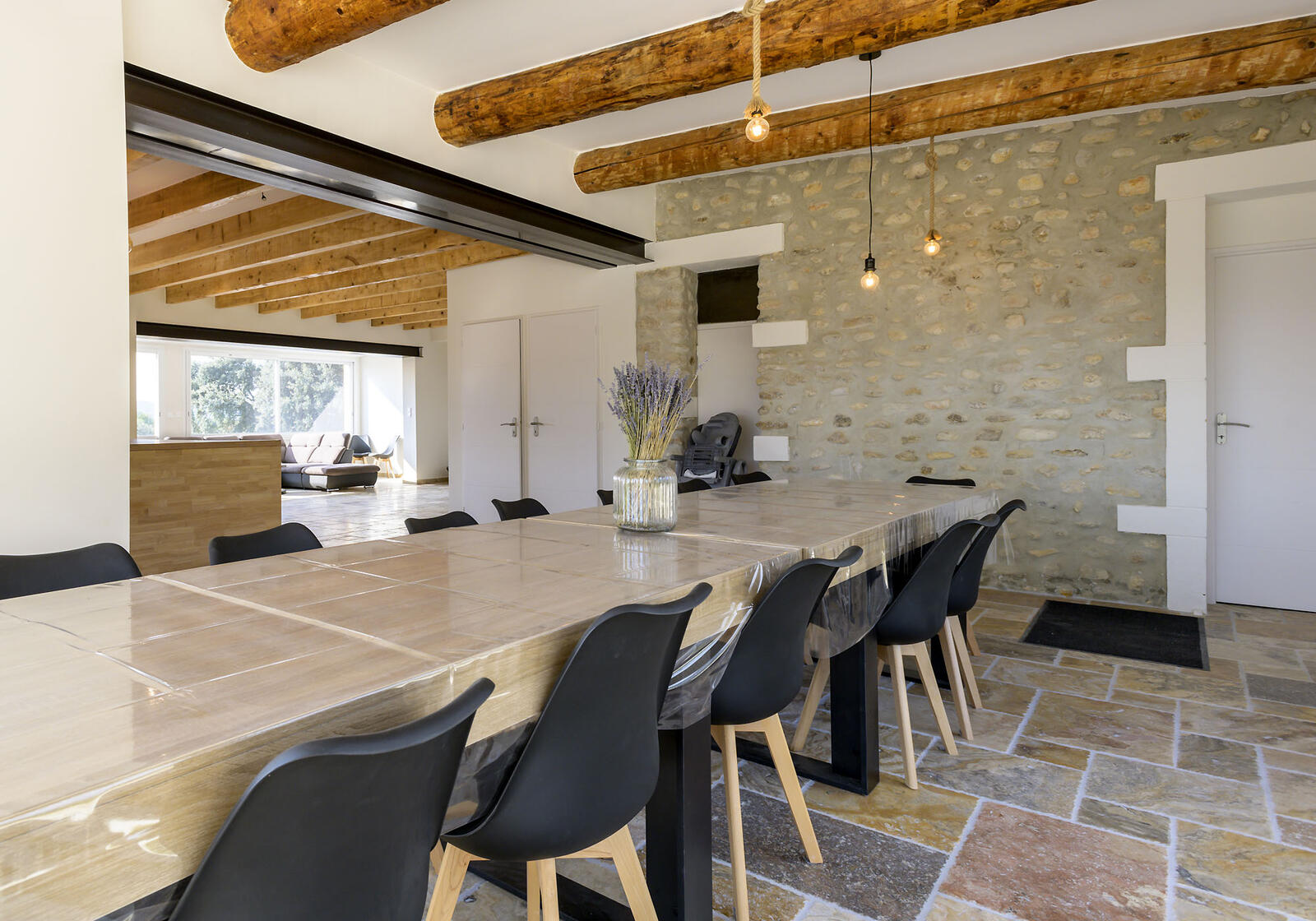 Large dining room with exposed beams