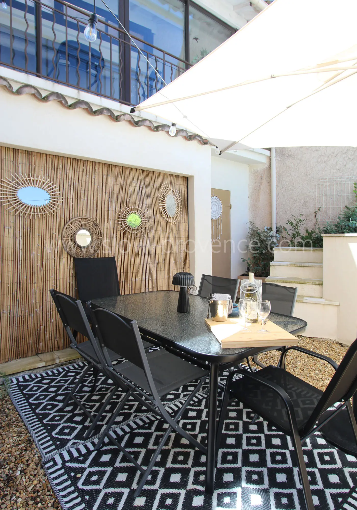 Shaded dining area by the water