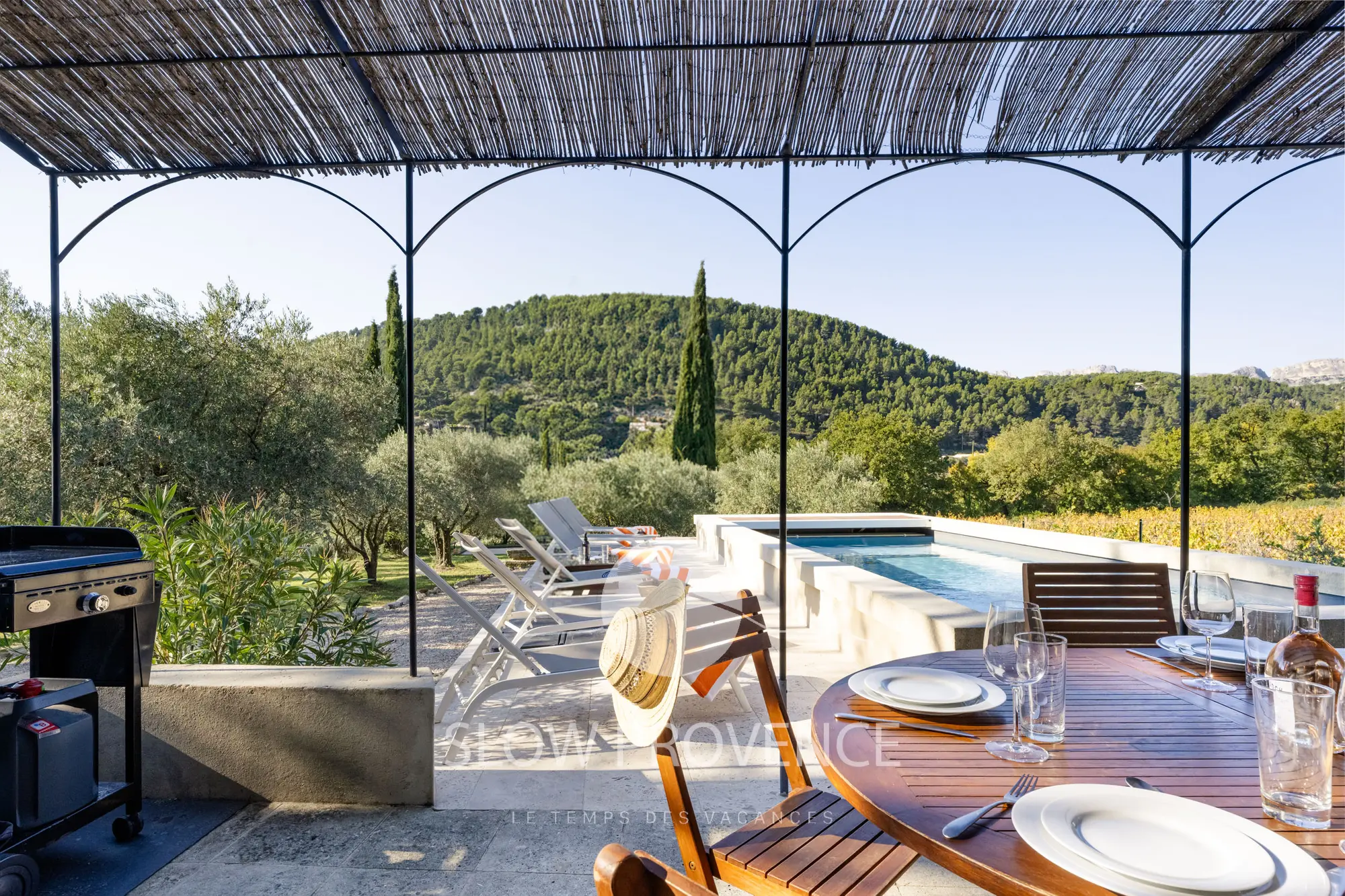 With a view of the pool and nature