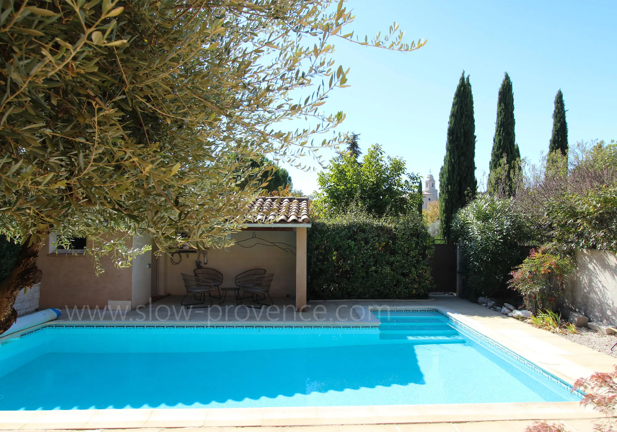 With shaded garden seating area