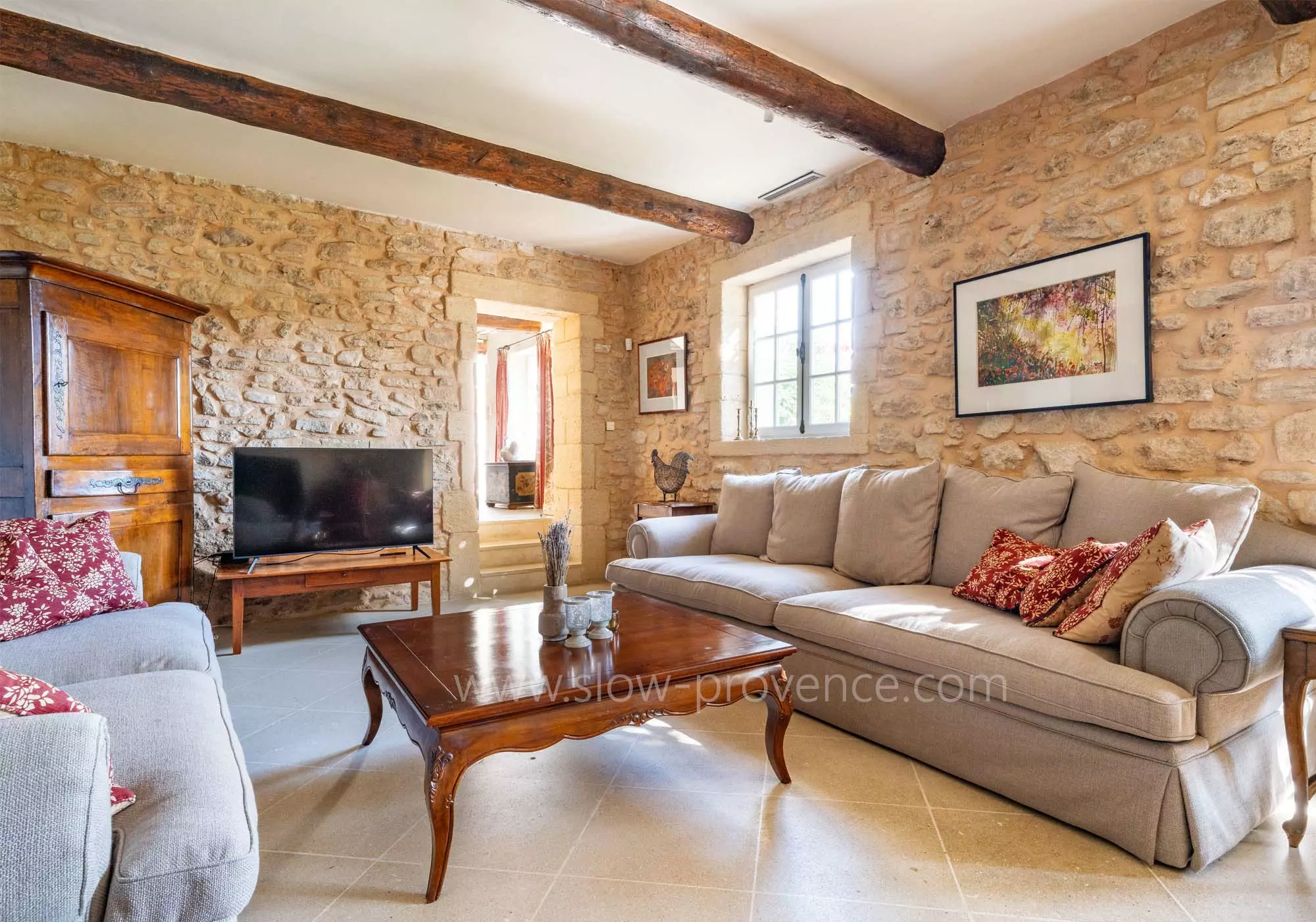 Comfortable living room with stone walls